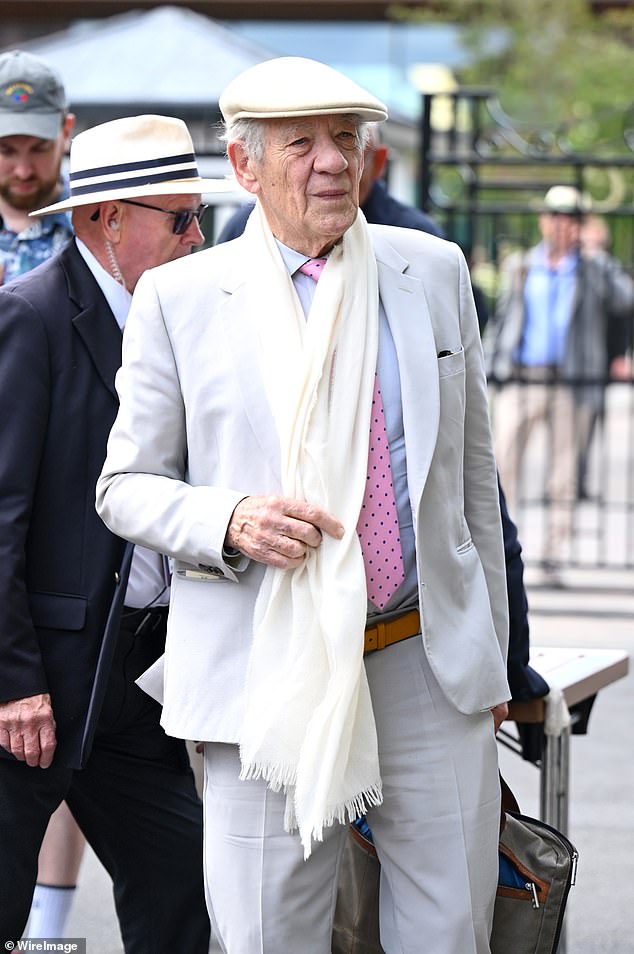 Dapper: The Lord Of The Rings star, 84, donned a total white suit with a matching beret hat and pink tie