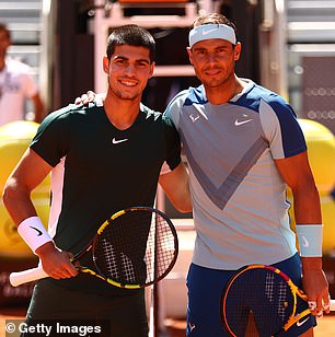 Alcaraz posing with Rafael Nadal