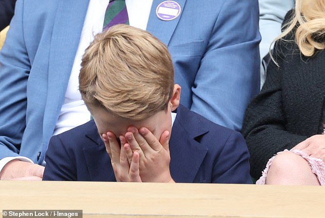 It's not an easy watch! Prince George put his head in his hands as he watched the action on Centre Court