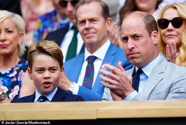 The Prince of Wales applauded a point as he sat alongside Prince George, who was intently watching