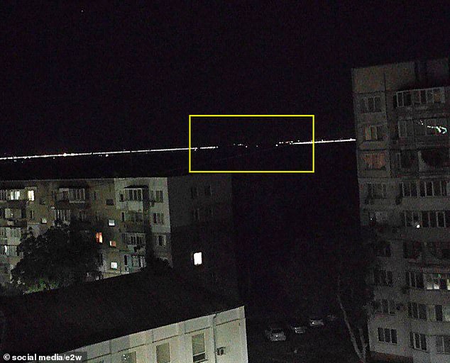Eyewitnesses reported one span and a support pillar collapsed during the attack which occurred just after 3am local time. Pictured: The Crimean bridge after the strike, with the area believed to have been destroyed highlighted in yellow