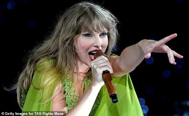 Taylor Swift pictured performing Illicit Affairs during her Eras Tour show in Kansas City, Missouri, earlier this month