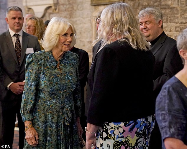 The Queen was beaming with delight as she chatted to performers and members of staff in Brecon cathedral