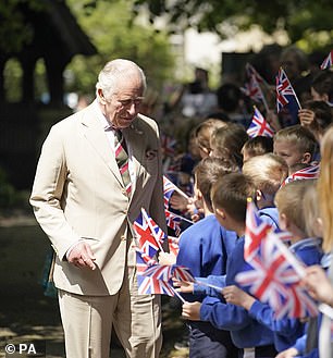 As they arrived at the Cathedral, the couple were greeted by crowds of cheering and excited schoolchildren who were waving Union flags