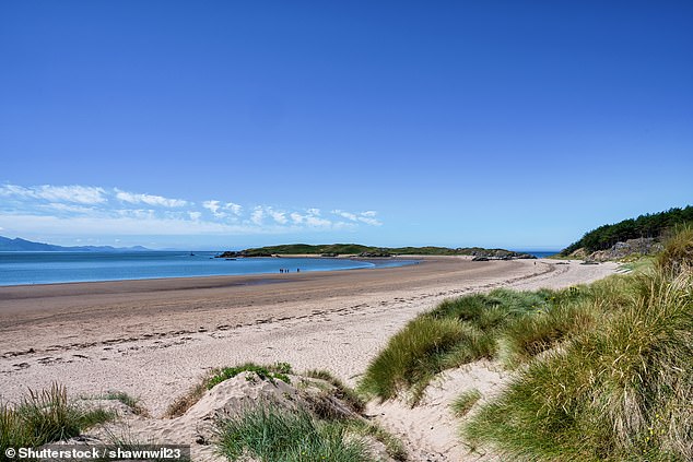 LLANDDWYN BEACH, ANGLESEY ISLAND: This Blue Flag beach is described by Visit Wales as 'an ideal picnic site during fine weather but also an exhilarating place when the winter winds blow', with the tourism site adding that 'its rolling dunes, large rock outcrops and mixture of historic buildings makes it an ideal place for an afternoon of exploration'