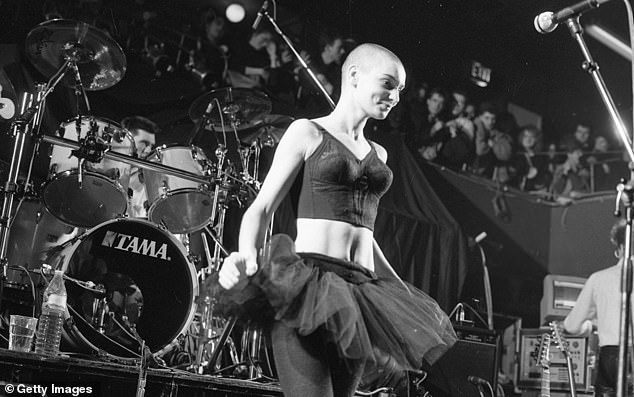Sinead O'Connor is pictured on stage at the Olympic Ballroom in 1988