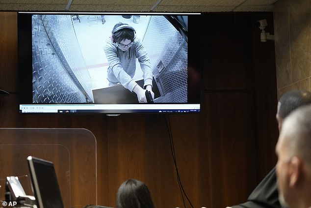 Crumbley is shown at a shooting range in a video displayed in court Thursday. Video of the school shooting itself was not broadcast by the media by order of the judge