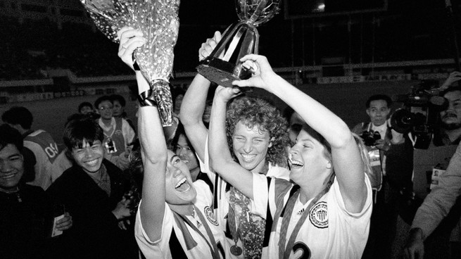 A photo of soccer players celebrating after the 1991 World Cup.