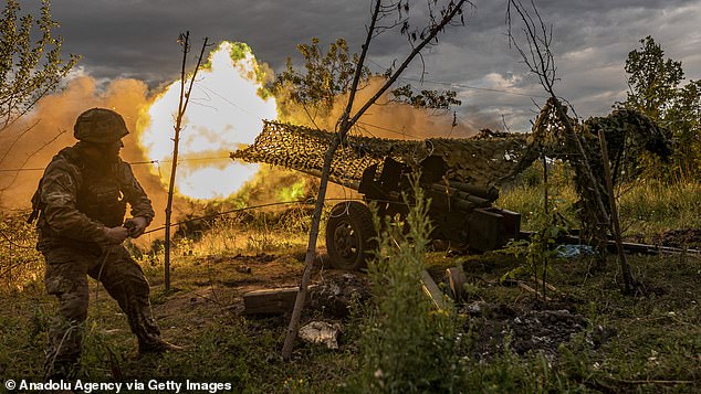 Putin has repeatedly claimed Ukraine has suffered heavy losses, without offering evidence. Pictured: A Ukrainian soldier firing artillery at Bakhmut
