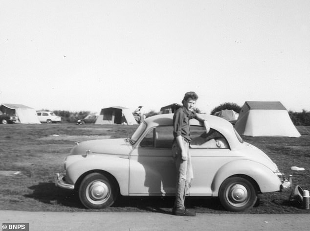 Greg with the Morris Minor on a camping trip in 1977