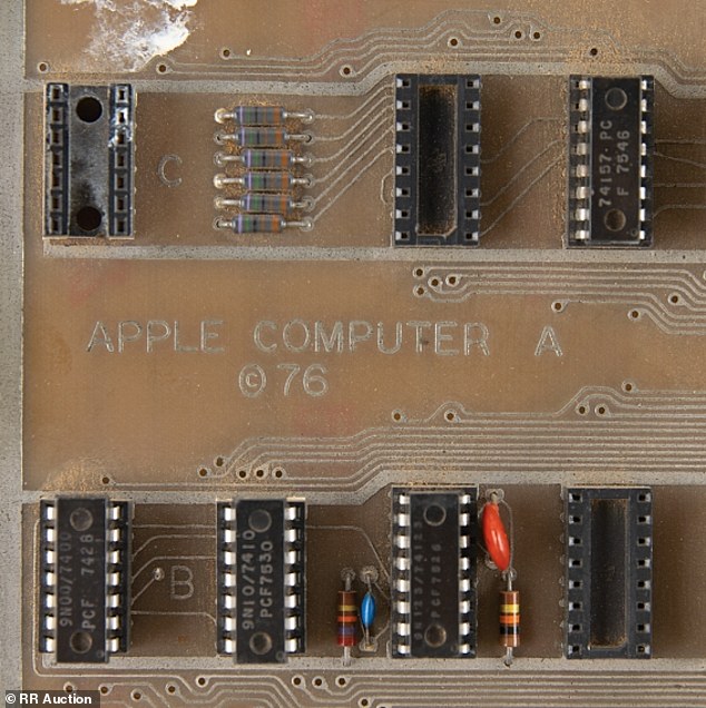 Markings: Billed as a 'rare' and 'historic' item, it is essentially a circuit board covered in chips and wires, embossed with the words 'Apple Computer A ©76'