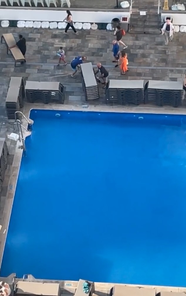As the pool opened at 10am, holidaymakers swarmed for their spot so they could grab a sunlounger, put a towel on and leg it back into the hotel for breakfast