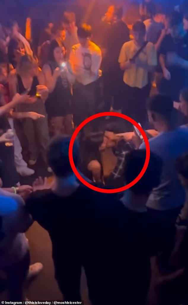 An anonymous couple has divided opinion after a video of their mosh pit-style proposal emerged on social media
