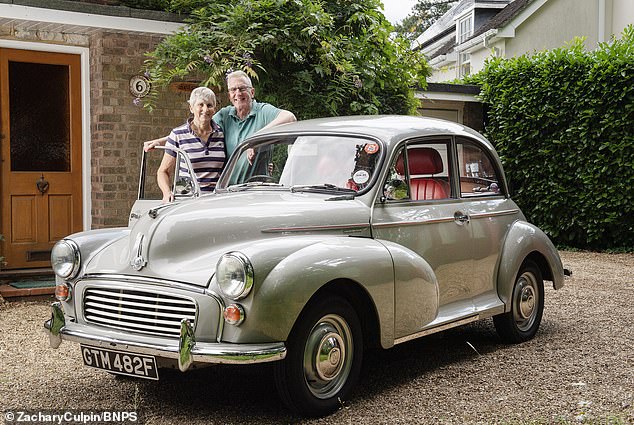Husband and wife Greg and Nicky Hoar with the Morris Minor. Nicky and their children, Emily and Peter, learnt to drive in the car
