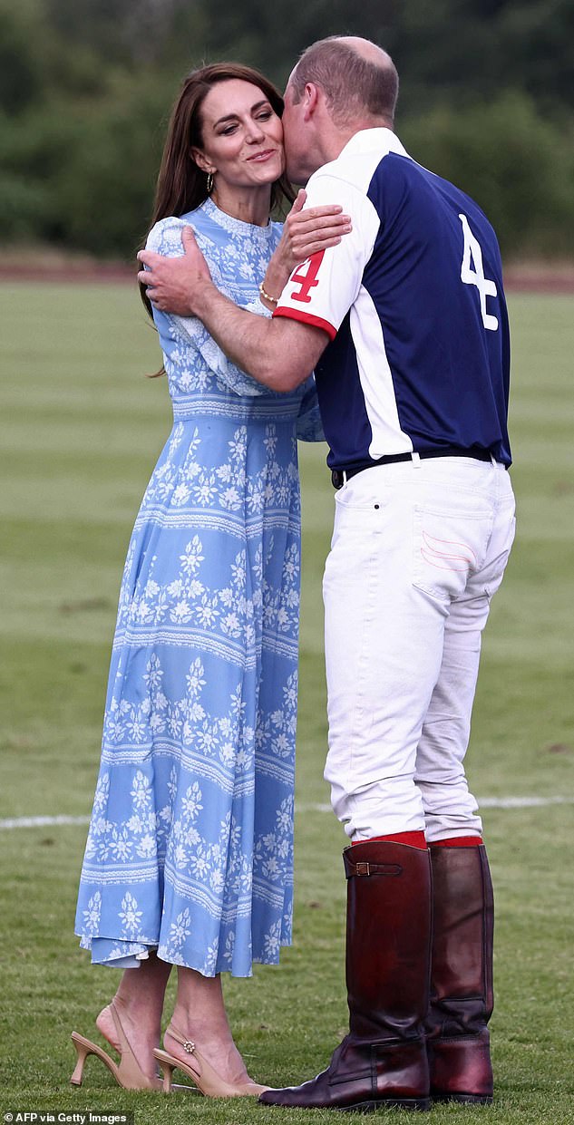 Formal: While the Princess of Wales, 41, frequently offers a 'love pat' to William when they're out at official engagements, the Prince struggled to look quite so at ease with PDAs at the polo in Windsor yesterday - resulting in an awkward clinch
