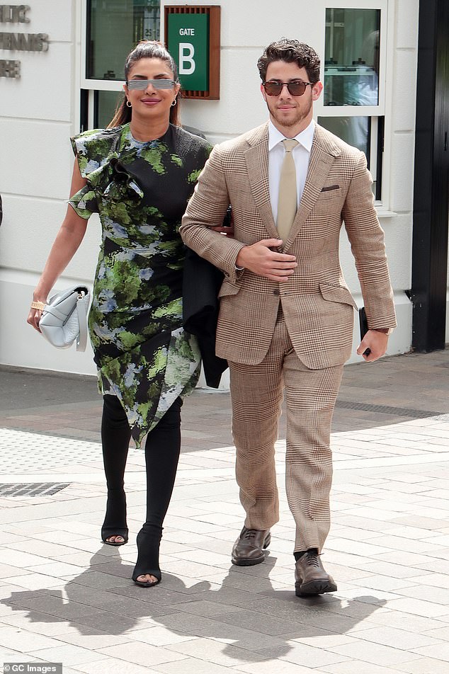 Wimbledon glam: Leading the way was Hollywood stars Priyanka Chopra and Nick Jonas, who brought the glamour to the at All England Lawn Tennis and Croquet Club on Saturday
