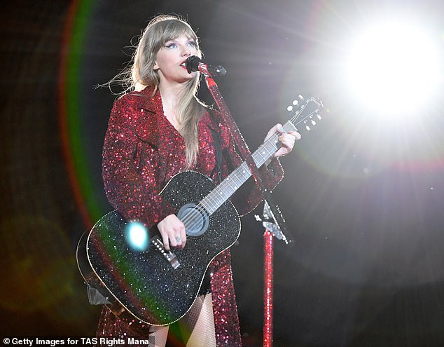 Taylor Swift pictured performing All Too Well (10 Minute Version) at her Eras Tour show in Denver, Colorado earlier this month