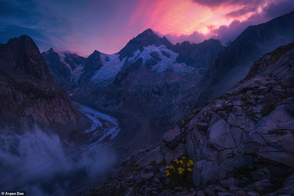 The Swiss Alps can be seen during the sunrise in this otherworldly shot. Das says that the mountain range offers a 'refined and awe-inspiring beauty'