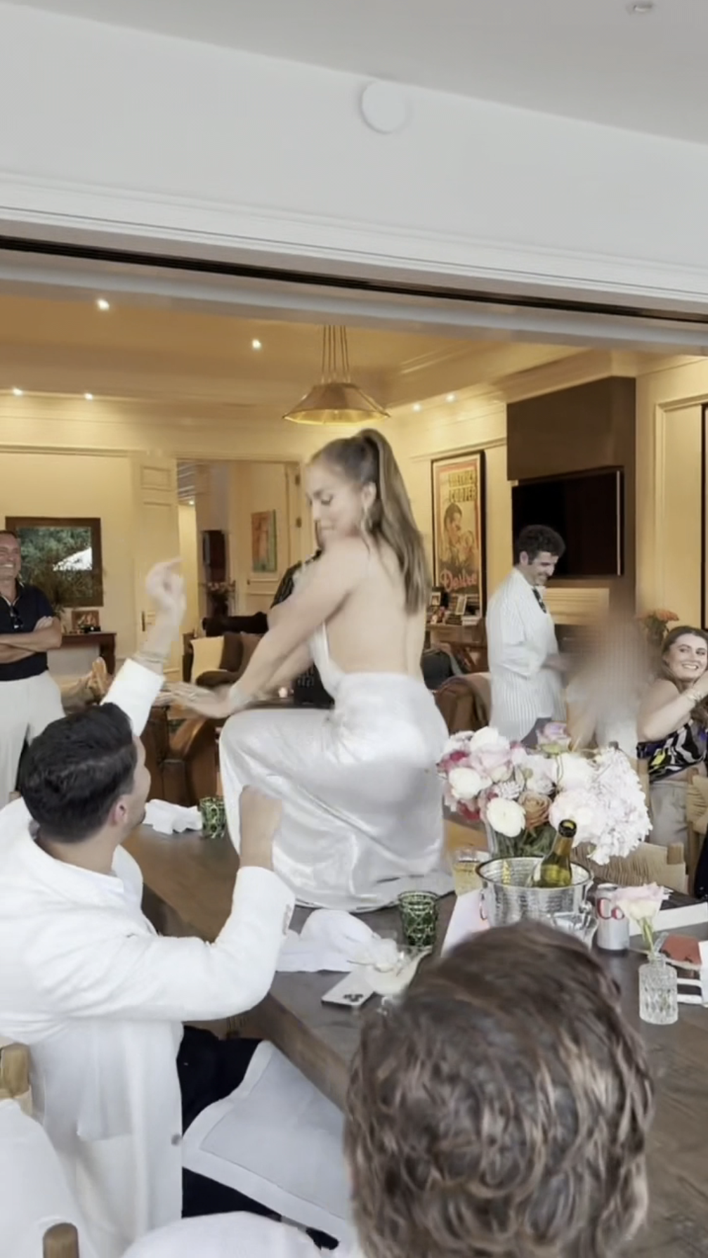 Jennifer Lopez dancing on a table