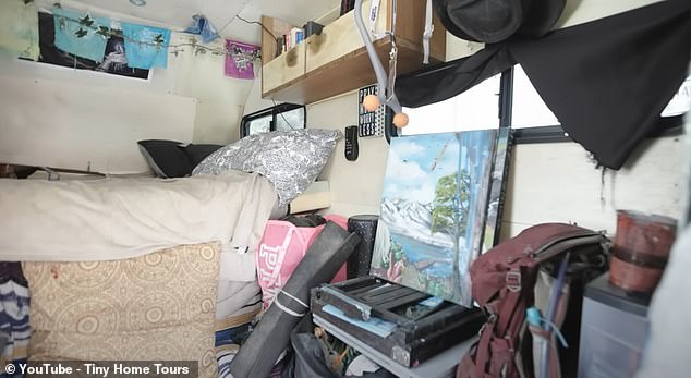 Explaining what inspired him to craft a tiny home, he says: 'I just got tired of kinda running the rat race... just to pay rent, just to come home and watch TV, and do it all over again'