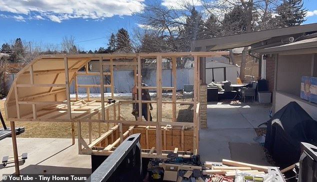 Videos posted to his Instagram account, @wandering_healer7, show him building a timber frame before he installs it to the back of his vehicle and gives it a paint job