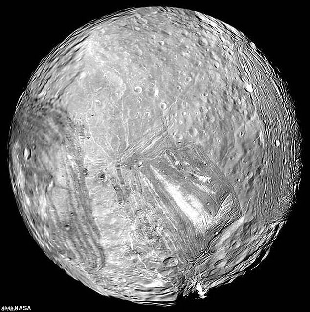 Uranus' icy moon Miranda is seen in this image from Voyager 2 on January 24, 1986. Miranda was discovered by Gerard Kuiper in February 1948