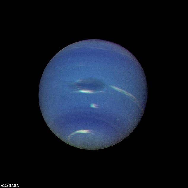 Neptune's blue-green atmosphere is shown in greater detail than ever before by the Voyager 2 spacecraft as it rapidly approaches its encounter with the giant planet