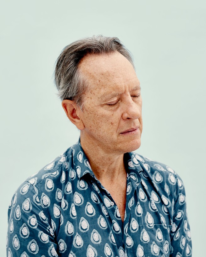 Portrait of the actor Richard E. Grant with his eyes closed