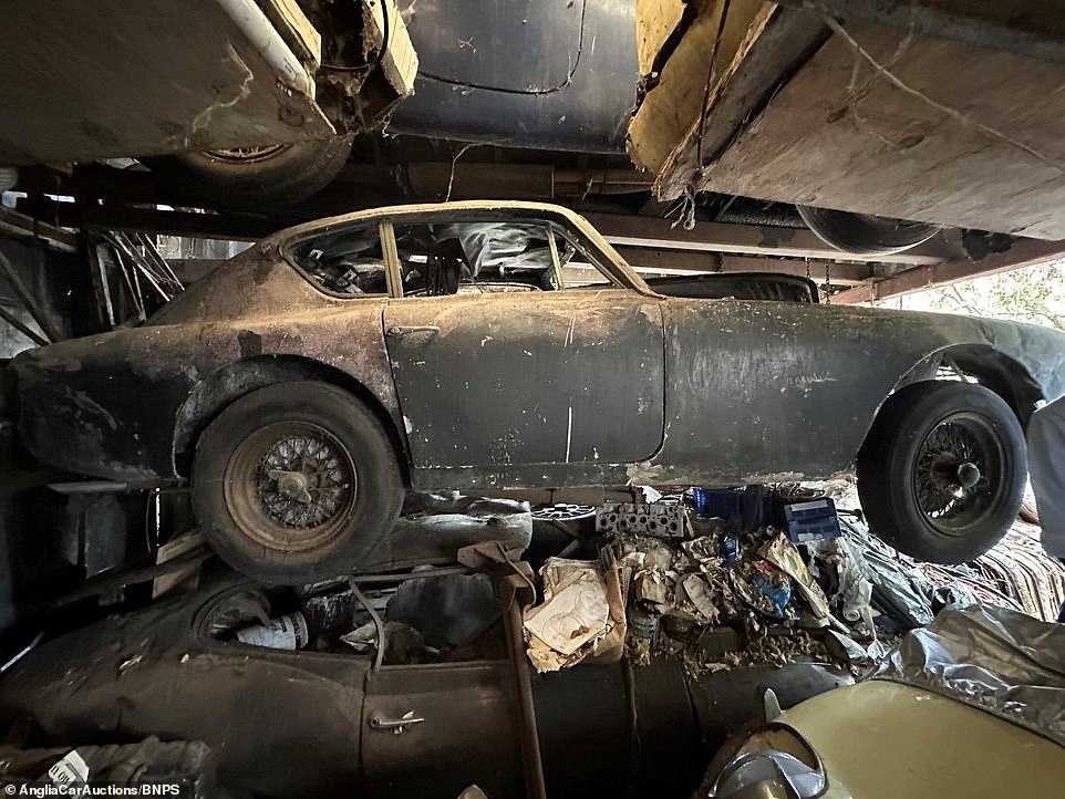 The six classic sports cars were all squeezed into the crumbling barn together. As you can see, the way in which they've been stored hasn't been conducive to retaining their value