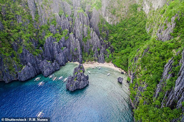 30. SECRET LAGOON, MINILOC ISLAND, EL NIDO, PALAWAN, PHILIPPINES: This idyllic spot offers travellers 'crystal-clear waters' and 'tropical jungle', Big 7 Travel reveals