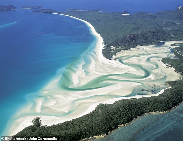 5. WHITEHAVEN BEACH, WHITSUNDAY ISLANDS, AUSTRALIA: ‘Stretching across 7km (four miles), this brilliant white silica sand beach is among one of the purest in the world,’ says Big 7 Travel. It notes that ‘the sand doesn’t retain heat, so it’s a fantastic place to walk barefoot, even on a hot day’