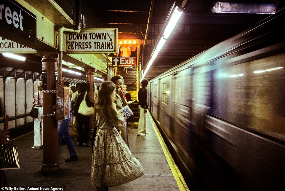 Downtown Express 72nd Street Station, West Side IRT, 1977. Residents wait on the platform as a subway train rushes past