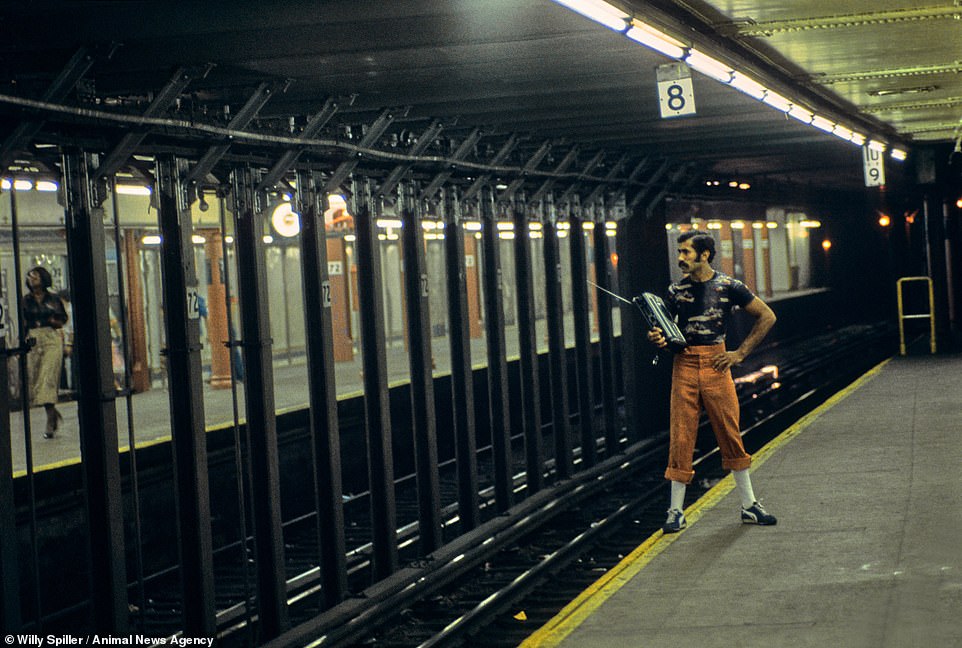 Ghettoblaster Man Waiting, 72nd Street Station West Side IRT Line, 1977. A man stands perilously close to the tracks on a deserted platform