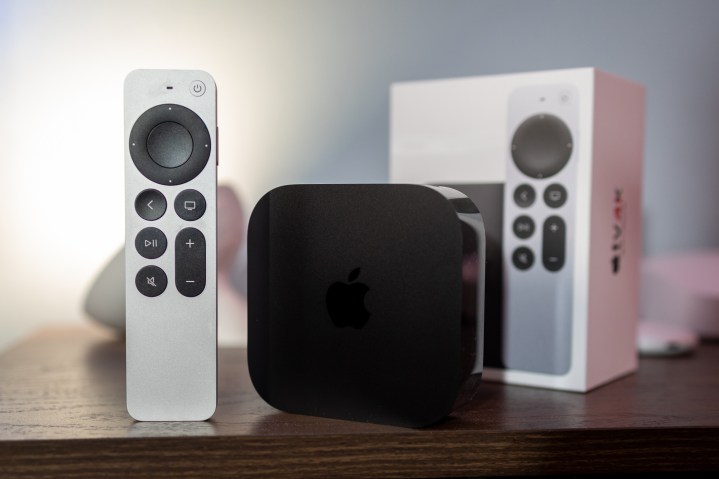 Apple TV 4K hardware with remote and retail box.