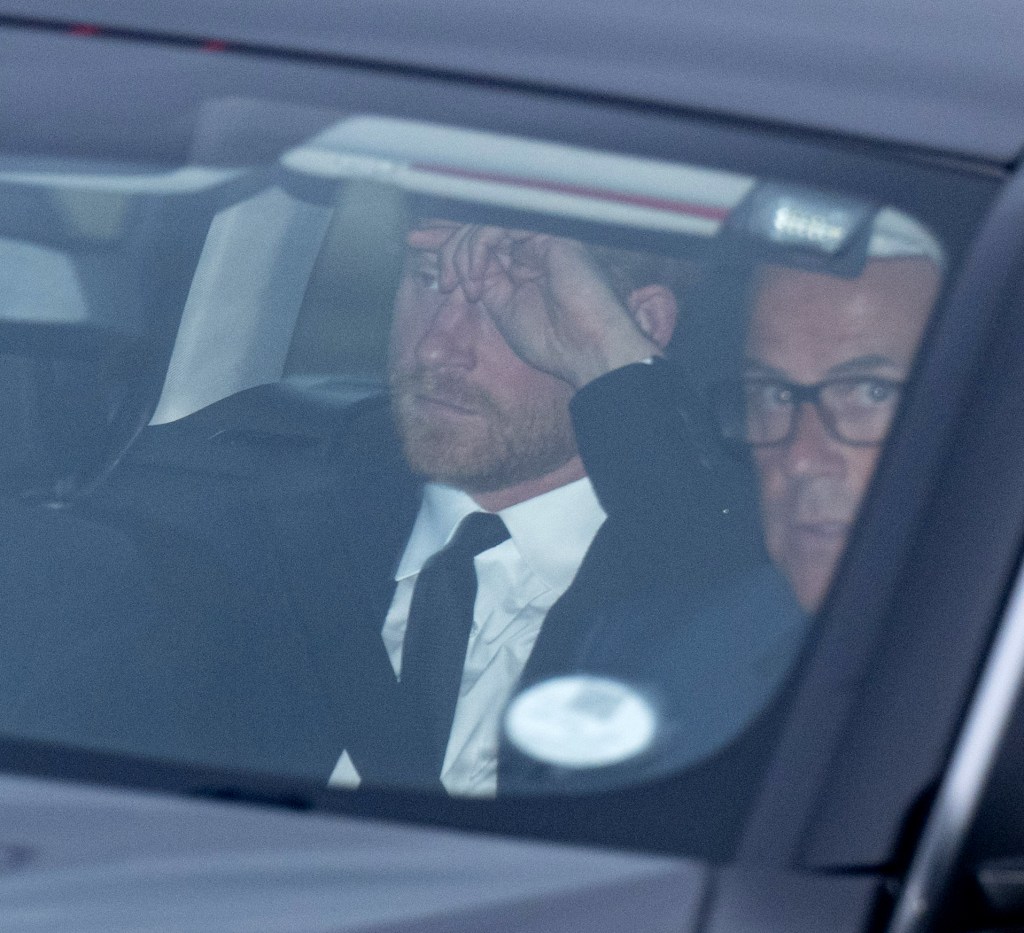 Prince Harry in a car. 