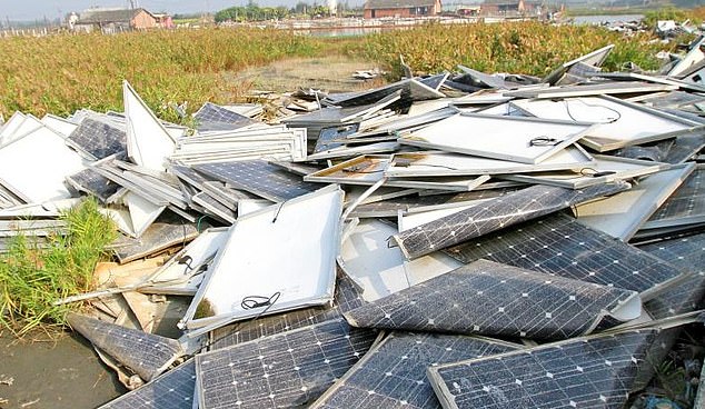 A general view of broken solar panels left in a heap. Experts warn that action must be taken now to properly deal with them