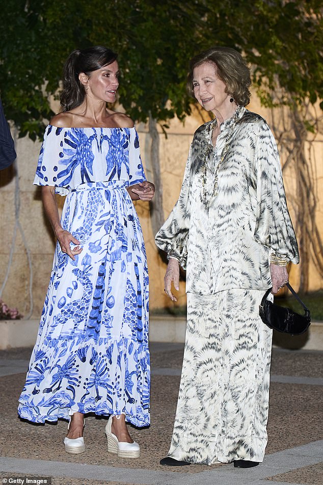 Both women dazzled in their elegant dresses which worked to keep them cool in the sweltering weather