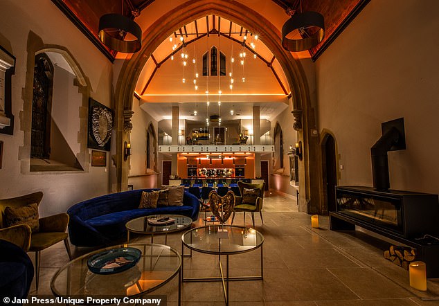 The former church's jaw-dropping updates include an impressive entrance hall, dining room, lounge and several bathrooms. Modern fixtures including CCTV and smart home technology have been built around the church's original features, like this yawning archway