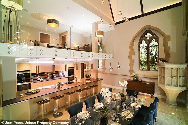Those responsible for the luxurious conversion have fully exploited the church's high and sloped ceilings. The kitchen/dining room features a mezzanine floor above ¿ and an original pulpit in the corner