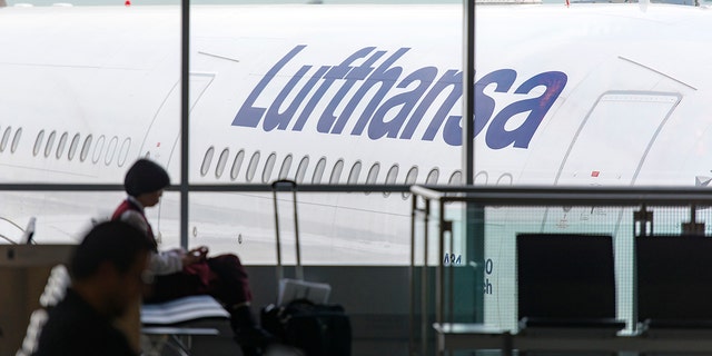 A Lufthansa flight parked at the gate in Germany