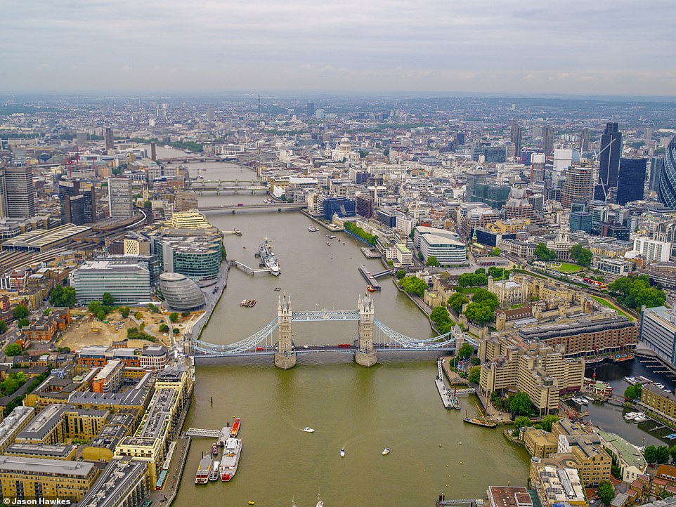 THEN: An aerial view of the River Thames and Tower Bridge, City of London, in 2006