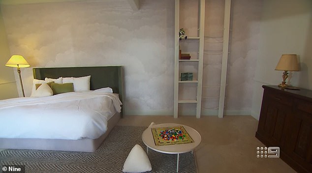 The childhood sweethearts were tasked with designing a children's room themed after the character Buzz Lightyear from the Toy Story films. But the couple threw the bright, cartoonish brief out of the window and creating a beige room with heavy wooden furniture