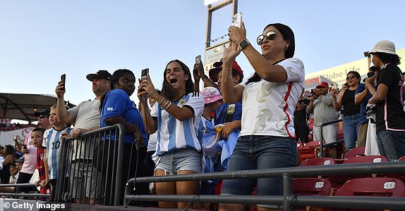 FRISCO, TEXAS - AUGUST 06: Fans reacts as Lionel Messi #10 of Inter Miami CF walks onto the pitch prior to the Leagues Cup 2023 Round of 16 match between Inter Miami CF and FC Dallas at Toyota Stadium on August 06, 2023 in Frisco, Texas. (Photo by Logan Riely/Getty Images)
