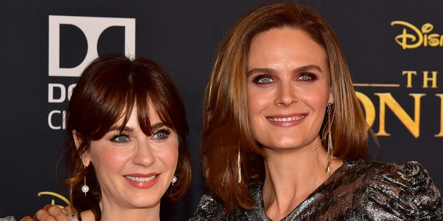 Zooey and Emily Deschanel at the premiere of "The Lion King"