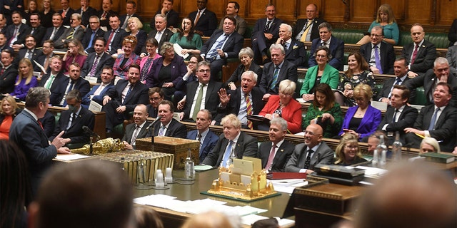 members pack the UK House of Commons