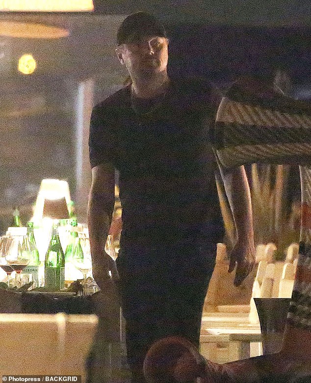 Dinner: DiCaprio would soon be back on Italian soil as he dined with a huge crowd of family and friends at Maito Restaurant in Forte dei Marmi