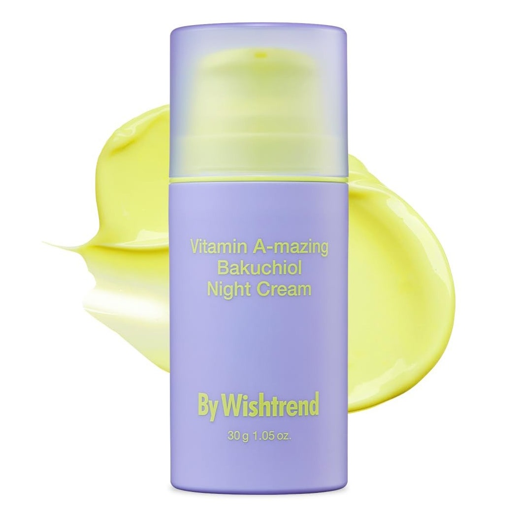 By Wishtrend Vitamin A-mazing Bakuchiol Night Cream light purple pump bottle with swatch of yellow night cream behind it on white background