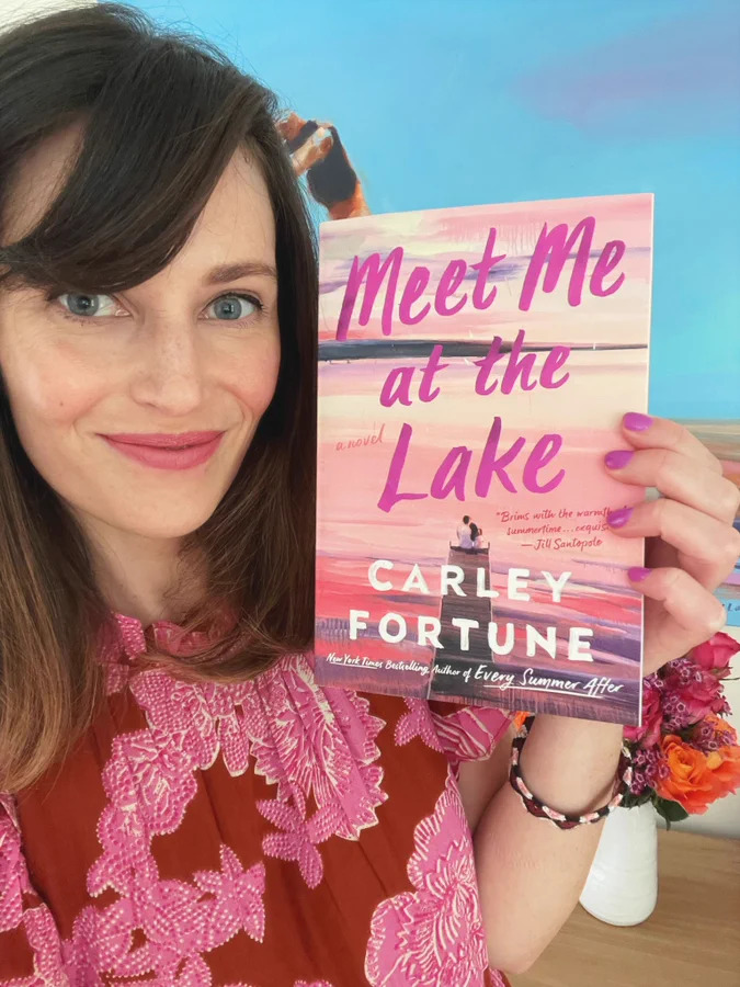 Carley Fortune with her book "Meet Me at the Lake"