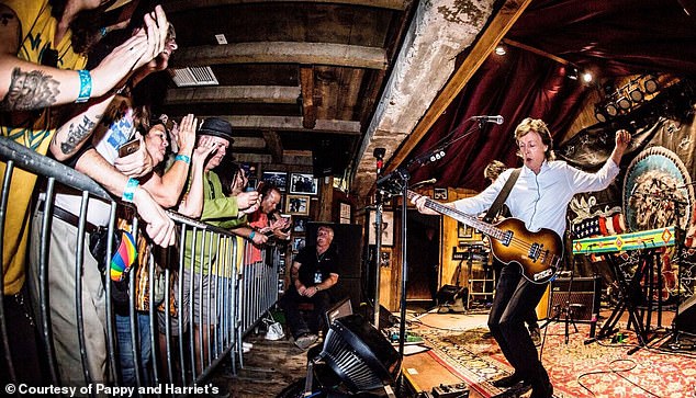 Paul McCartney is seen performing at Pappy and Harriet's, a Pioneertown institution