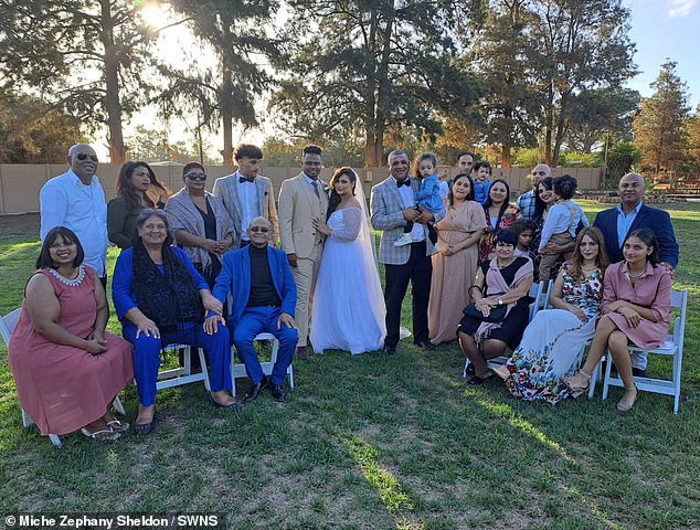 Miche Zephany Sheldon, 26, from Cape Town, was walked down the aisle at her wedding by 'two dads' - her biological dad and the husband of the woman who kidnapped her at birth (Pictured groom Justin and bride Miche with their biological families)